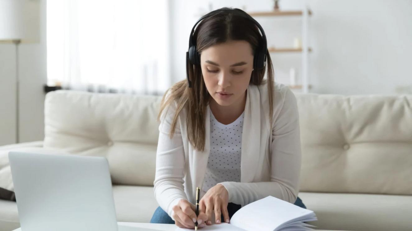 Investment professional analyzing financial data in modern Taiwan office environment